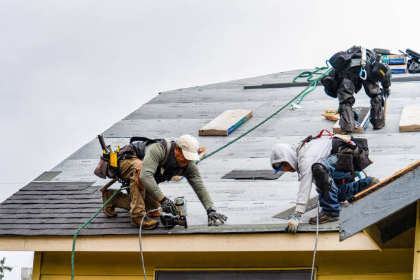 Professional Roofing technician working in Islandia, NY